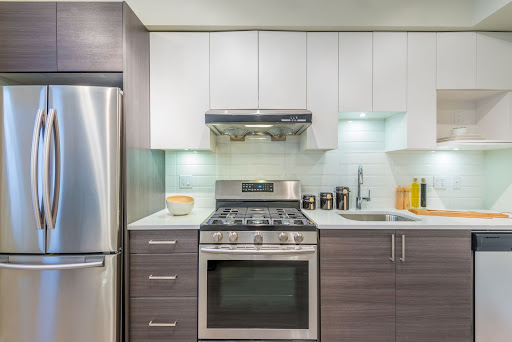 Stainless steel appliances in a kitchen.